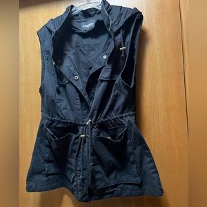 Utility style vest with cinch waist. Cotton and comfortable.